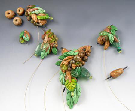 unassembled pieces of molded clay